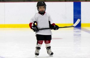 Walden Orthodontics | SE Calgary Orthodontist | Kid Playing Hockey